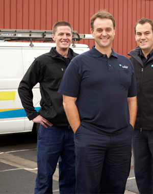 three of our Del Mar plumbers standing ready by their truck