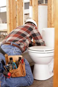 John is working on a toilet installation in Del Mar, CA